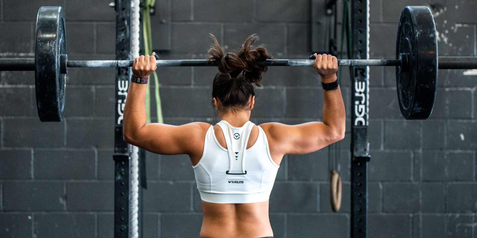 A strong woman lifting weights