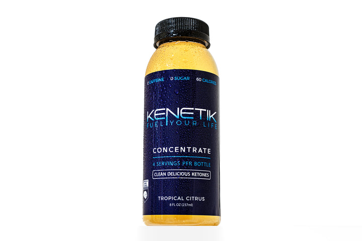 Kenetik concentrate tropical citrus with condensation on white background