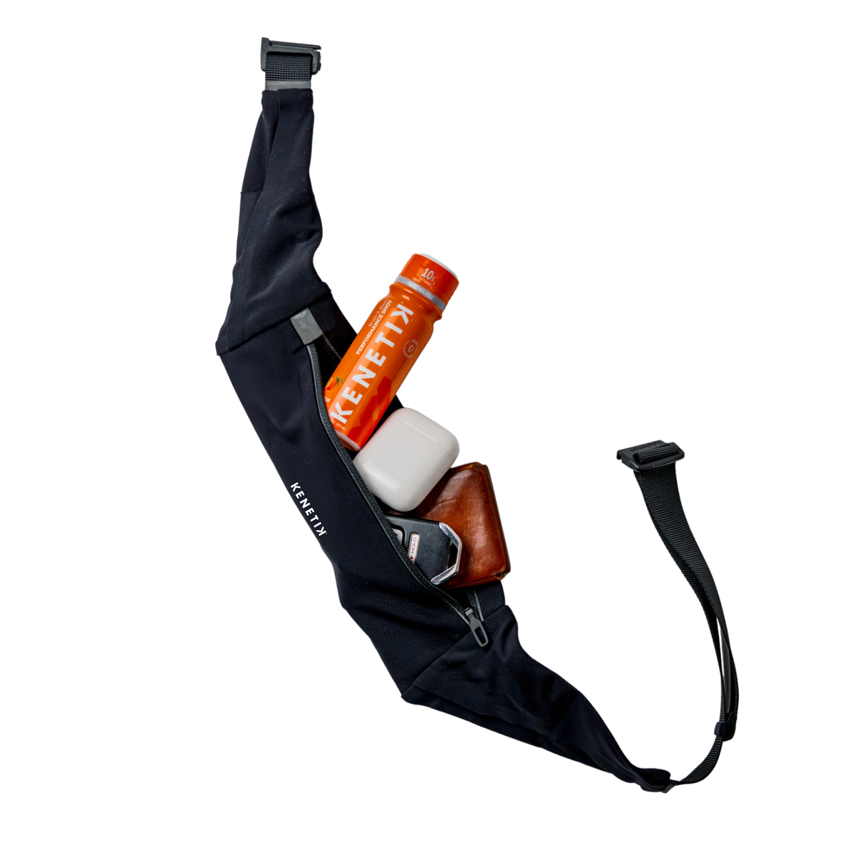 Black running belt unzipped to reveal a Kenetik shot, Airpods, keys and a wallet. All on a white background.