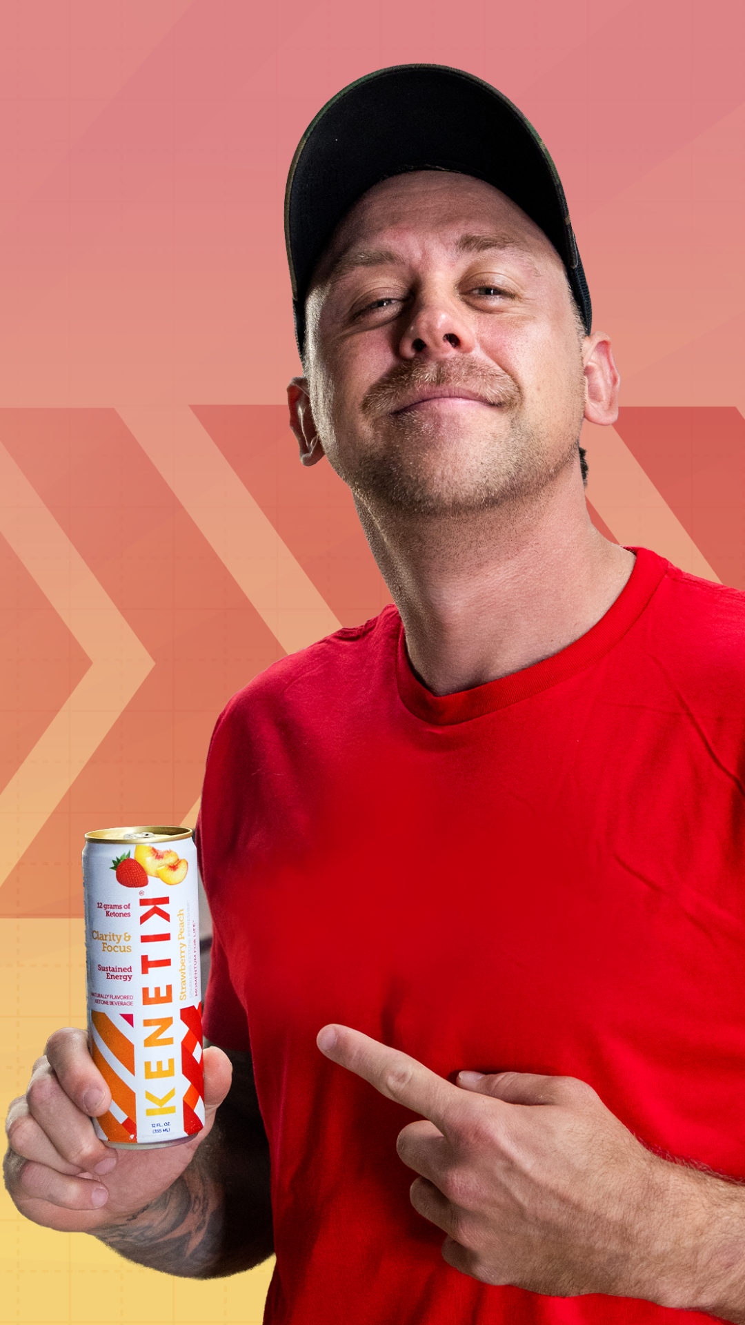 Roman in red shirt holding a can of Kenetik against a colorful background