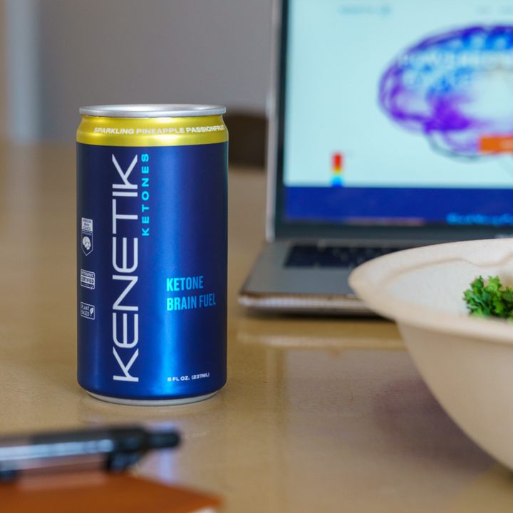 Kenetik RTD in a can with a laptop